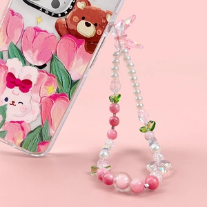 Close-up of pink tulip beaded phone strap with cartoon rabbit and bear phone case