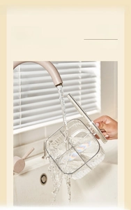 Waterproof kitchen seasoning box shown under running water to demonstrate easy cleaning