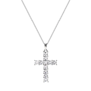Macro shot of silver cross pendant featuring eleven square-cut cubic zirconia stones