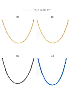 Dettaglio di catene a maglie in acciaio inossidabile con taglio a diamante in oro e nero
