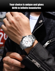 Detailed shot of CURREN silver steel watch band on wrist with black leather jacket