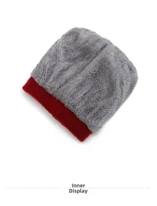 Close-up of thick grey faux fur lining and red knitted edge for warmth