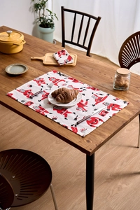 Detailed close-up of Santa Claus print on square cotton linen Christmas dinner napkins