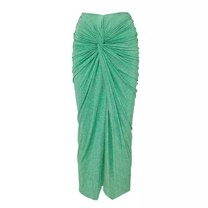Detail of high-waist green glitter midi skirt with twist knot design and draping texture