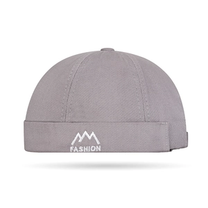 Gray brimless docker hat with white mountain embroidery and Fashion text on white background