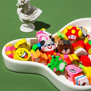 Cute cartoon animal erasers including panda and frog shapes in a cloud-shaped white bowl