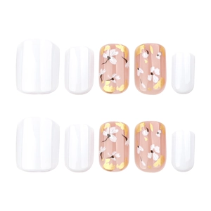 Short square white and nude pink press-on nails with floral patterns and gold foil flakes