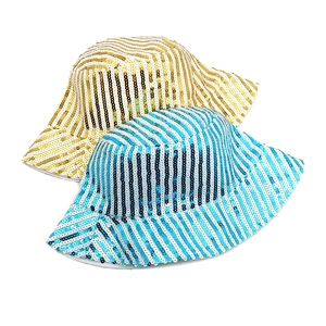 Detail of sequined bucket hats with gold and blue stripes for stage performances