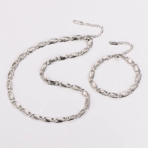 Detail of silver paperclip link necklace and bracelet set with S925 engraved clasp