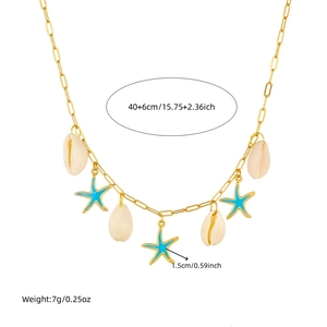 Gold necklace with white shell and blue starfish charm featuring size dimensions