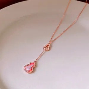 Elegant rose gold double hollow wulu pendant bracelet with red shell and zircon stones
