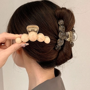 Minimalist gradient bead claw clip set showing beige and grey round pearl hair catch clips