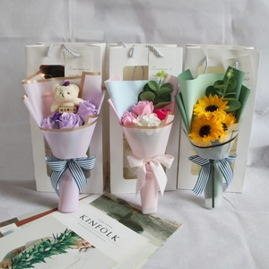 Detailed set of soap flower bouquets with sunflowers and plush bear in gift bags