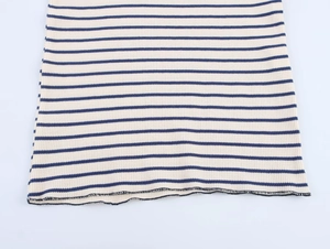 Detail shot of the blue and white striped knit dress hemline showing fine fabric texture