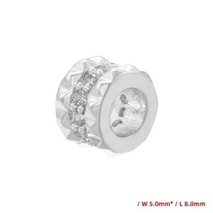 Detailed macro view of 5x8mm honeycomb coin charm with zircon inlay for DIY jewelry