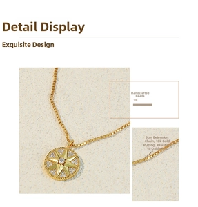 Detail of 18k gold plated compass pendant with beaded chain and 5cm extension