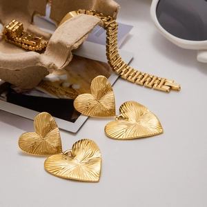 Exaggerated textured golden heart stud earrings with luxury stainless steel finish