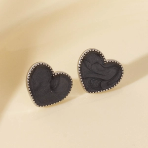 Minimalist heart earrings in stainless steel with black marble texture and beaded silver edge
