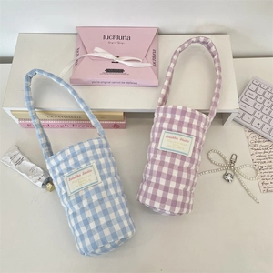 Quilted plaid cotton water bottle bag with heart stitching and soft handle straps