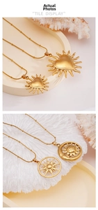 Tile display of 18K gold plated stainless steel sun and heart pendant necklaces