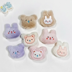 Plush cartoon bear and rabbit brooches in various colors with soft faux fur and embroidery