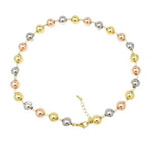 Three-tone beaded necklace featuring gold, silver, and rose gold polished round beads