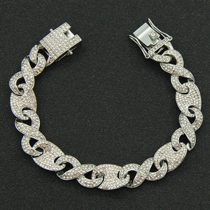 Men's hip hop silver Cuban link chain with sparkling rhinestones on black background