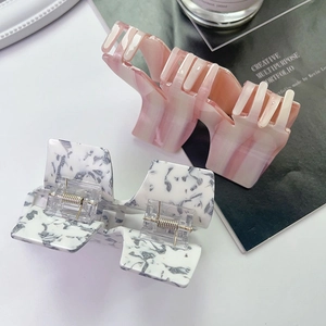 Pink striped and grey marble acetate claw clips set for elegant hair styling