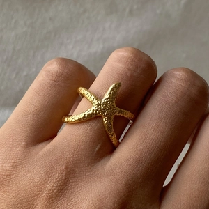 Golden starfish open ring in stainless steel with a unique hammered texture finish