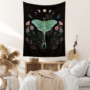 Detail of bohemian butterfly tapestry featuring Luna Moth and moon phases on bedroom wall