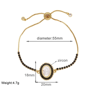 Detailed view of Virgin Mary charm bracelet with black zircons and 55mm adjustable chain