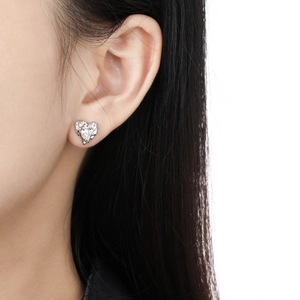 Minimalist S925 sterling silver heart stud earrings with lava texture on female model