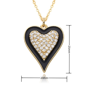 Detail view of gold heart pendant with black enamel and zircons, size 25mm by 20mm