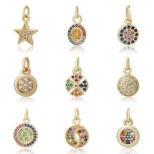 Set of gold DIY charms with colorful zircons in star and round shapes for jewelry making