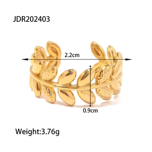 Macro shot of gold olive leaf ring with detailed measurements and product dimensions