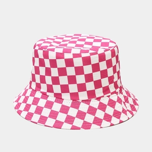 Detail of pink and white checkered bucket hat showing stitching and canvas texture