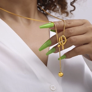 Golden snake chain necklace with toggle clasp and ball pendant for women