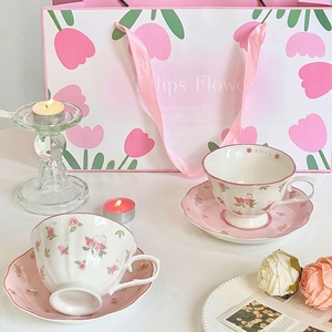 Ceramic coffee cup and saucer set with pink rose floral pattern and gift bag