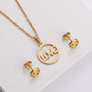 Polished 18k gold plated titanium steel jewelry set with circular LOVE pendant and earrings