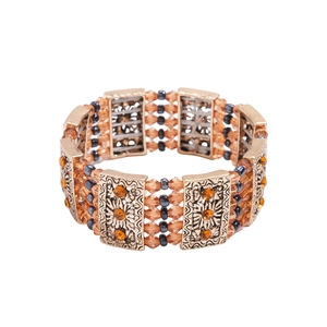 Ethnic vintage wide elastic bracelet with amber resin stones and gold filigree patterns