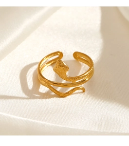 Detail of 18K gold plated snake ring showing hammered texture on white silk background