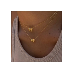 Elegant gold double-layered necklace featuring two minimalist butterfly bow pendants for women