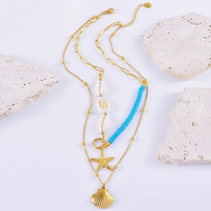 Double-layered gold titanium necklace with sea shell, starfish and turquoise pendants