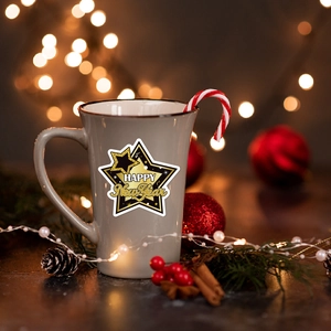 Grey ceramic Happy New Year mug with golden stars and festive holiday decor on wooden surface