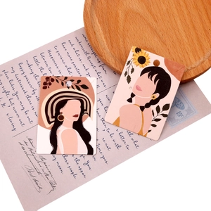 Minimalist earring display cards featuring fashionable female illustrations for jewelry
