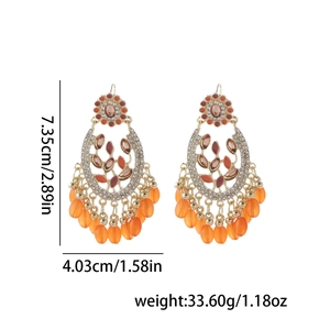 Detail view of bohemian beaded tassel earrings with precise size and weight measurements