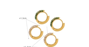 Detail of 18K gold plated titanium earrings with green and clear zircon in two sizes
