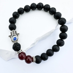 Natural black lava stone bracelet with red beads and blue evil eye hamsa hand charm