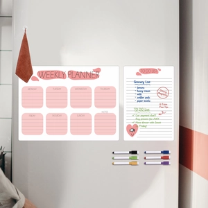 Detail view of magnetic weekly planner and shopping list with six colorful dry erase markers
