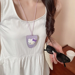 Close-up of purple leather necklace holder with cartoon kitty charm worn by a model